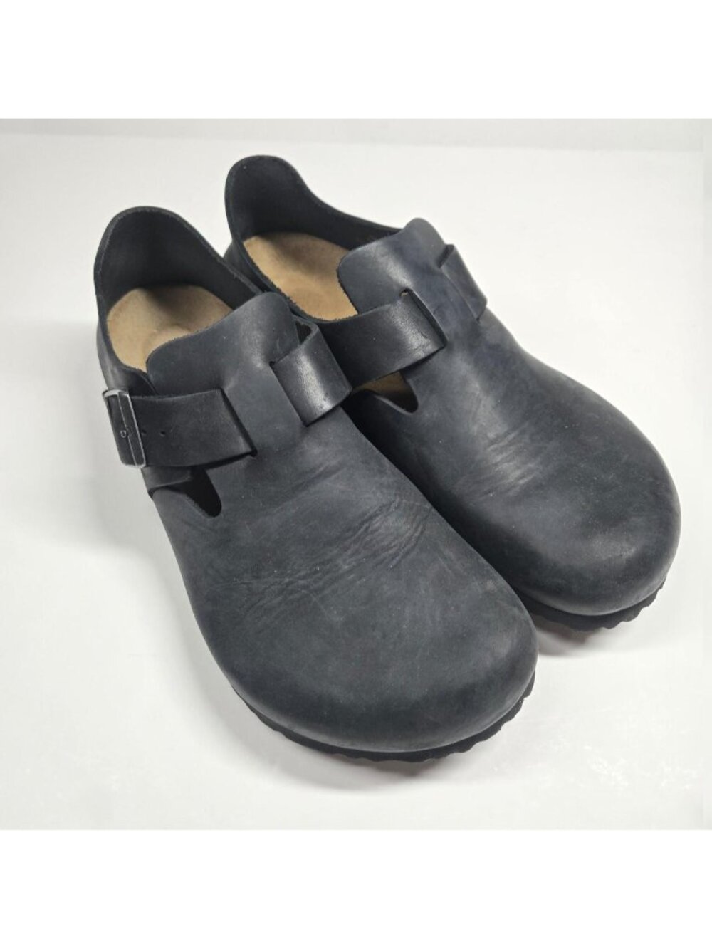 Birkenstock London Black oiled leather clogs.